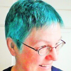 Arvin's daughter, Cindy, and the teal hair she gifted herself with on her 57th birthday (2015).