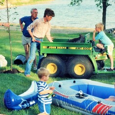 Busy at the lake! (back) son-in-law, Darrel Lukas; Arvin; oldest son, Allan; grandson, Erik (front) grandson, Sam Lukas; granddaughter, Audra (1991).