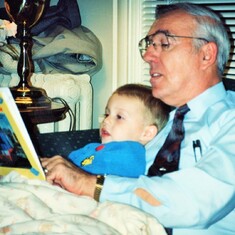 Arvin reading to grandson, Sam Lukas (1991).