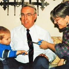 A new retirement tradition - the cutting of Arvin's work tie - by Sam & Cindy - at home in Coal Valley, IL (1992).