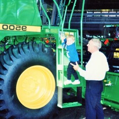 Arvin giving Sam & Cindy a tour of Deere in Moline.