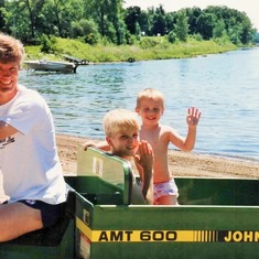 Allan Hagen driving son, Erik, and nephew, Sam, at Arvin & Bev's lake home (1993).