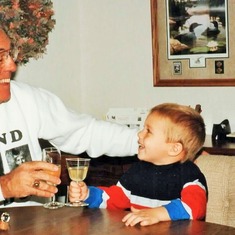 Arvin teaching grandson, Sam Lukas, how to toast while saying "SKOL!" (1992)