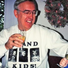 Cheers! (1992).  P.S. Arvin did these kinds of things with all his grandchildren. I'm just pulling from my own photo pile, so Sam appears more often.  Consider this representative. - Cindy
