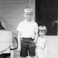 Allan & Cindy in front of their Grandma & Grandpa Hagen's house in Grenora, ND (1960).