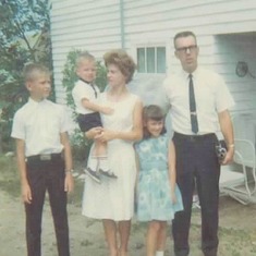 Allan, Brent, Bev, Cindy and Arvin at Adolph and Hazel's house in Grenora, ND (1966).