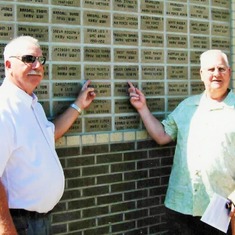 Alden & Chuck pointing to their name plaques.