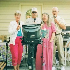 Karaoke at the 40th wedding anniversary:  Bev, Alden, Cindy & Arvin.