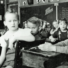 Alden (far right) in grade school (1944).