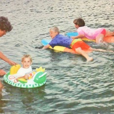 Bev with grandkids at the lake (1992).