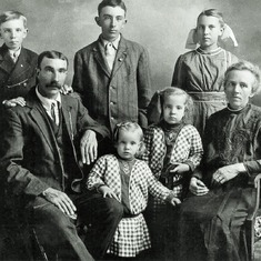 Peter & Anna family, ca 1914.Back: Henry "Hank", Oliver & Claudia.  Front: Carl, Peter, Inga, Mabel, Anna & Adolph.