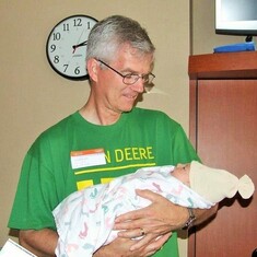 Proud first-time Grandpa Allan Hagen with Astrid.