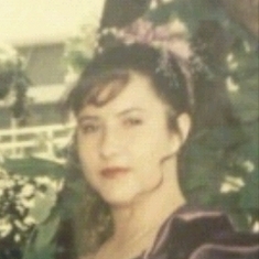 Athena...I think age 14 or 15...in her dad's wedding to Peggy as a bride's maid.