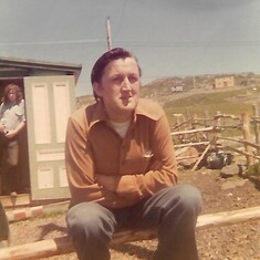 Dad on a fence, Lords Cove