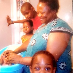 Aunty doing what she loved most ( taking care of her grandkids)