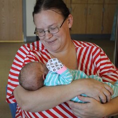 My mom with Avavin the day after she was born.
