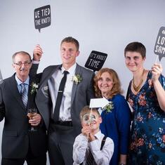 The Nielsen's with Silly Signs at Eric & Sam's Wedding-Oct. 3, 2015