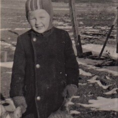1950 - Awna: age 4 with the cat that  followed him were ever he went