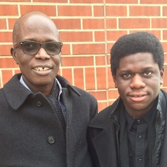 With his son, Ayotunde