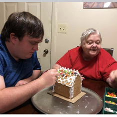 Look how happy ! You and Dustin enjoyed doing this GingerBread House so much !