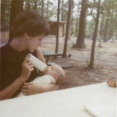 Barbara feeding Marc Dean (Son) in the park June 1969 (25 years old)