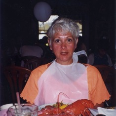 Mom with the lobster and a bib.  Ya gotta love it! in 1997 (53 years old)