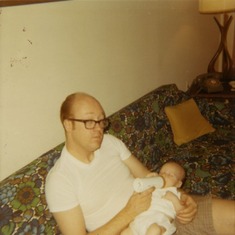 Ken Dean (First Husband) feeding Marc Dean (Son)  June 1969