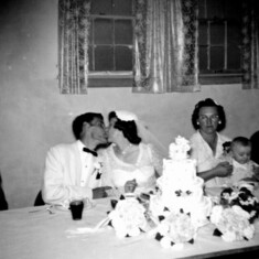 Mom and Dads wedding day. June 11, 1955 - My Grandma Winchell holding I believe to be my Uncle Jeff.
