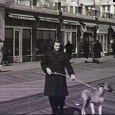 Barbara on the Asbury Park boardwalk in the early 1940s with one of the many dogs she loved through her life