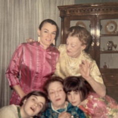 Always a lot of hugging in the matriarchy. GG/Betty Blair,  Gram/Susie Crane. We all wore hostess outfits in those days