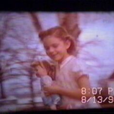 Barb with her doll at about age 7, taken from old movie film