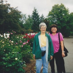 1990's Barb with a friend at a garden. Maybe her friend will see this photo & tell me more about it!