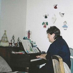 Barbara at the piano. Christmas Day 2003.