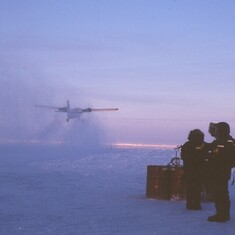Twin Otter airplane taking off from SHEBA site in ice fall 1997