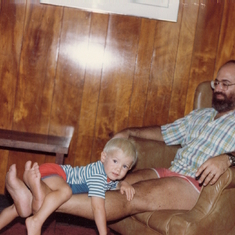 Aaron horsing around with Barry in the living room of our house on Sapelo 1984