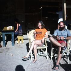 Ev and Barry enjoying cups of botz coffee at a Bedouin camp in the Negev desert