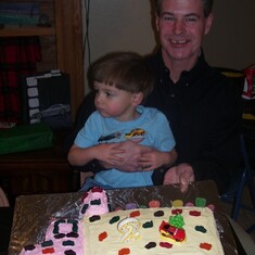Uncle Barry made Ryan's 2nd bday cake - a truck carrying Lightning McQueen!