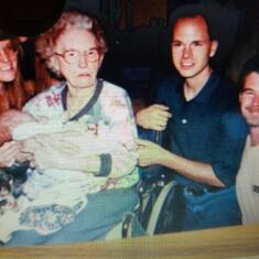 Kim, Grandma with Barry's sweet baby girl Brandi, Dan and Barry taken at Grandma's nursing home.