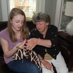 Bea teaching Hayley how to crochet in 2009.
