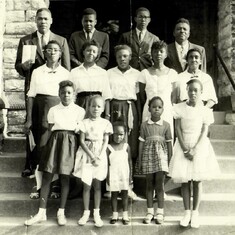 Constance (row 1, 2nd from L)  enjoyed singing and began at age 7 with the New Birth Chorus. 