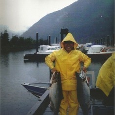 Dad's big smile and big catch!  What a contrast with the weather!