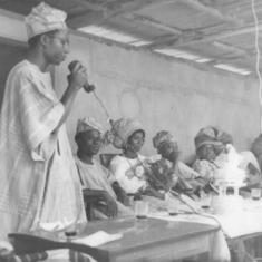 Dad Giving the Toast of the Bride & Bridegroom - 24 Dec. 1967. Seated are the Newly Wed Adesuyis, Chief & Mrs Henry Fajemirokun (chairman of the occasion & wife)
