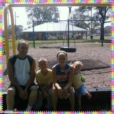 Papa, PJ, Krista, Brittany take a break at the park.  Fun times.