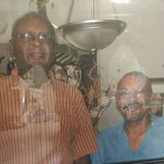 Uncle Hubert on the left daddy on the right. Looking like twins