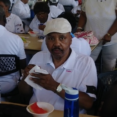 Daddy at an outdoor all white bar b que