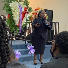 Pastor Andrea paying respect 