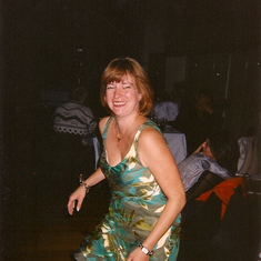Beth dancing in green dress