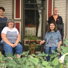 My siblings October 2020 sitting on the front porch of My Fair Lady Brd & Breakfast