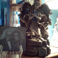 My Mom’s urn and a beautiful picture of my parents on my wedding day 10-29-94