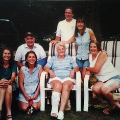 Six of the seven siblings with Mom.